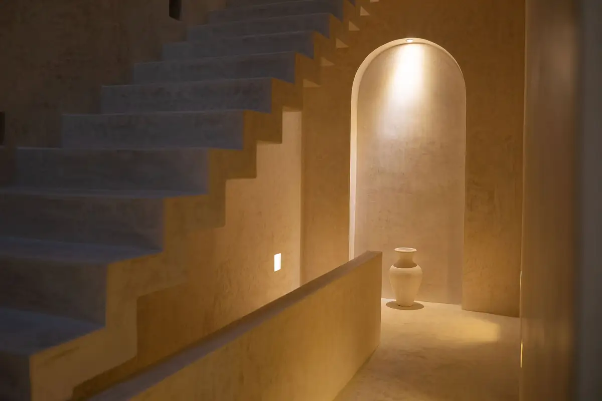 Altar — illuminated stair and arched niche