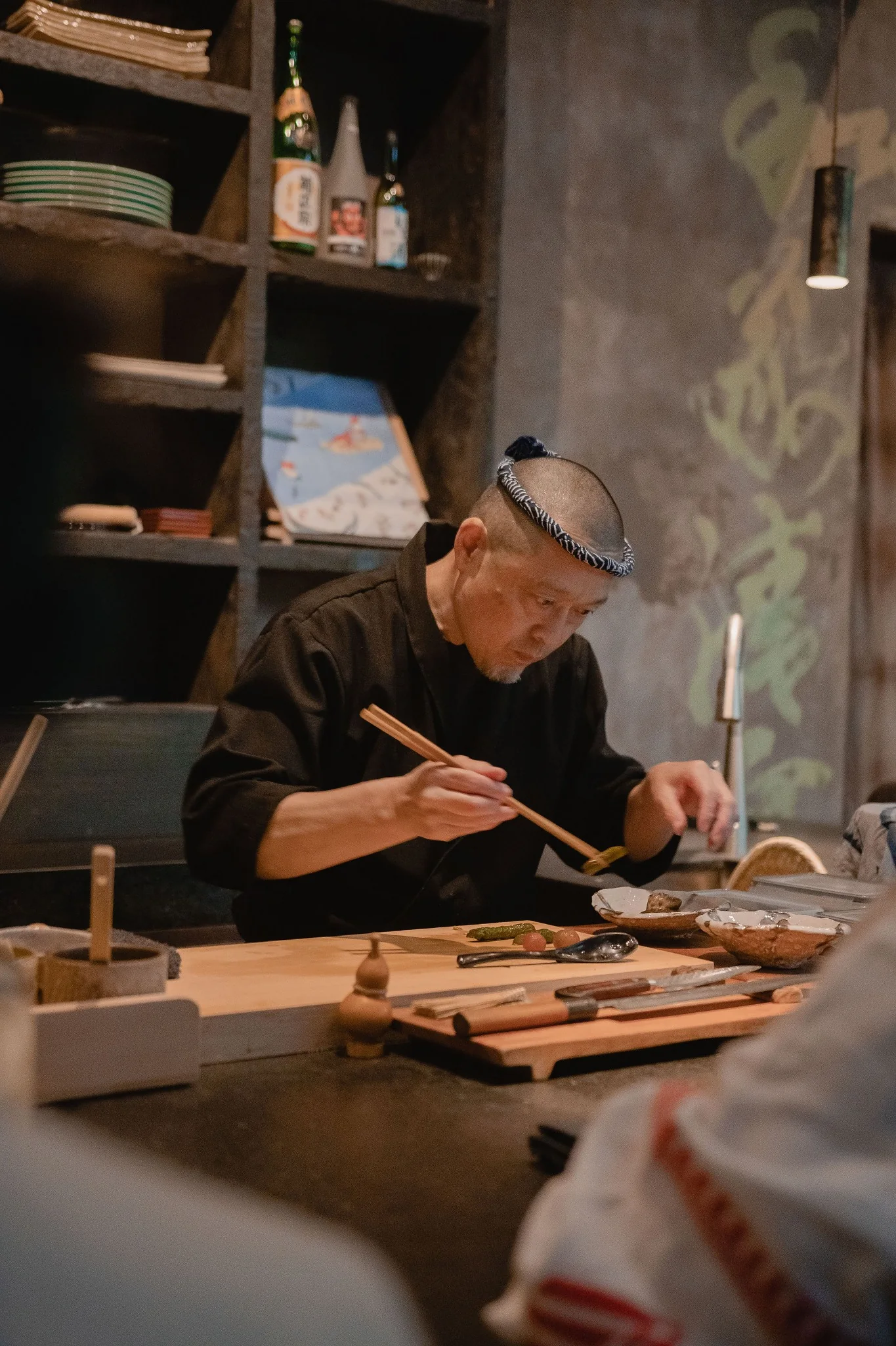 Kuu Jū — chef preparing a course